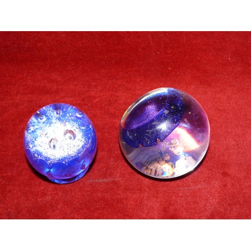 32 - Pair of vintage glass paperweights with blue bubble decoration. The larger has a flat top panel etch... 