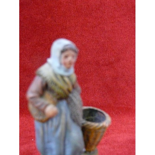 24 - A French studio pottery hand painted figure of a Breton fisherwoman, marked on the reverse for Ceram... 