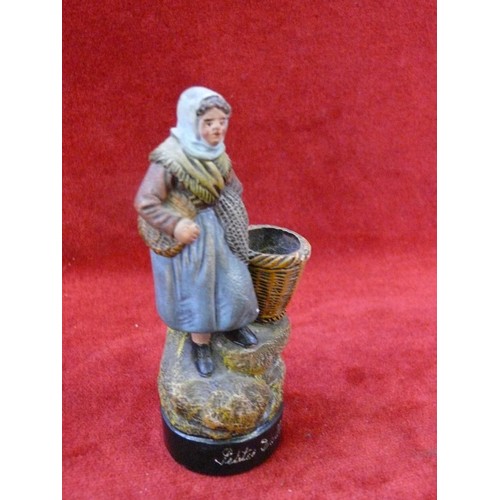 24 - A French studio pottery hand painted figure of a Breton fisherwoman, marked on the reverse for Ceram... 