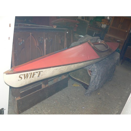 418 - Vintage Swift skin on frame kayak, with wire operated foot pedal rudder and paddles.