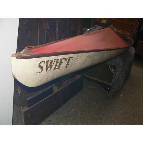 418 - Vintage Swift skin on frame kayak, with wire operated foot pedal rudder and paddles.