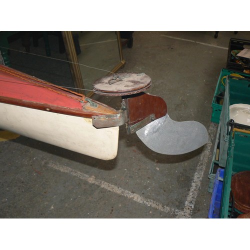 418 - Vintage Swift skin on frame kayak, with wire operated foot pedal rudder and paddles.