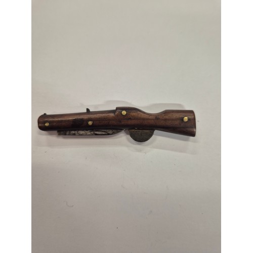 14C - Rare trench art treen pocket knife in the form of a rifle.