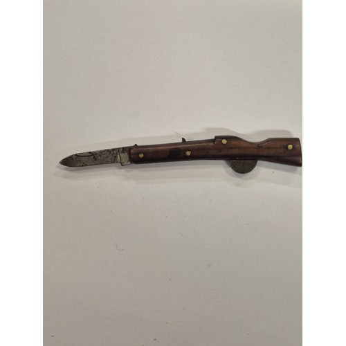 14C - Rare trench art treen pocket knife in the form of a rifle.