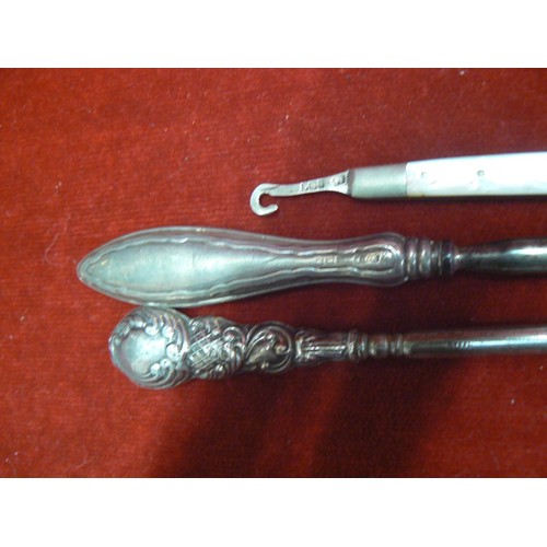 106C - Victorian sterling silver button hooks, 2x Silver & Steel, together with 1x small mother of pearl an... 