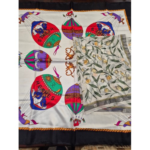 164A - 2x vintage designer silk scarves. One Hermes hot air balloon, together with one Gianni Versace Profu... 