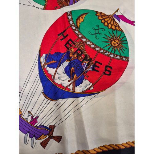 164A - 2x vintage designer silk scarves. One Hermes hot air balloon, together with one Gianni Versace Profu... 