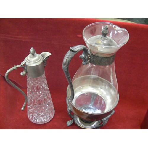 399 - Vintage claret jug, coffee carafe and warmer stand, two champagne buckets and a cocktail shaker