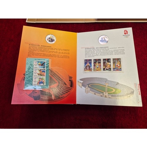 94C - Commemorative stamp and coin album from the 2008 Beijing Olympics. 'The Ancient Olympic Games Torch ... 