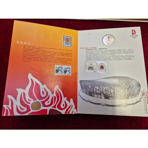 94C - Commemorative stamp and coin album from the 2008 Beijing Olympics. 'The Ancient Olympic Games Torch ... 