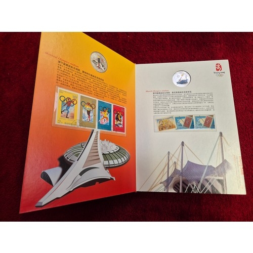 94C - Commemorative stamp and coin album from the 2008 Beijing Olympics. 'The Ancient Olympic Games Torch ... 