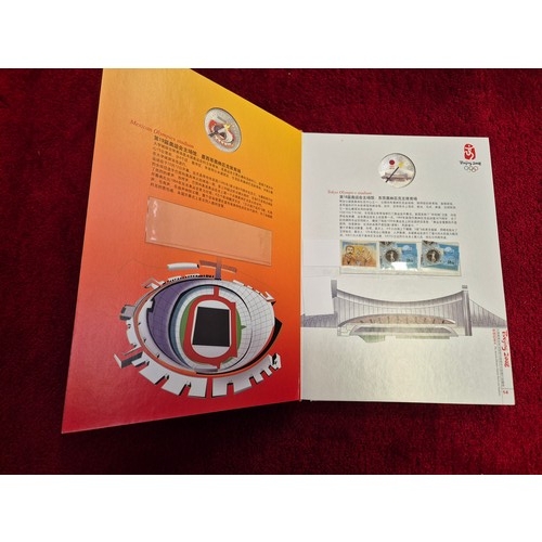 94C - Commemorative stamp and coin album from the 2008 Beijing Olympics. 'The Ancient Olympic Games Torch ... 