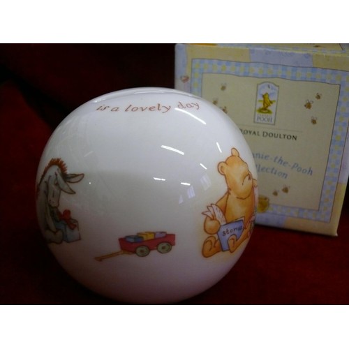 83 - 2 ROYAL DOULTON WINNIE THE POOH CERAMIC MONEY BOXES PLUS A ROYAL DOULTON BUNNYKINS MONEY BOX AND MAT... 