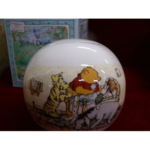 83 - 2 ROYAL DOULTON WINNIE THE POOH CERAMIC MONEY BOXES PLUS A ROYAL DOULTON BUNNYKINS MONEY BOX AND MAT... 