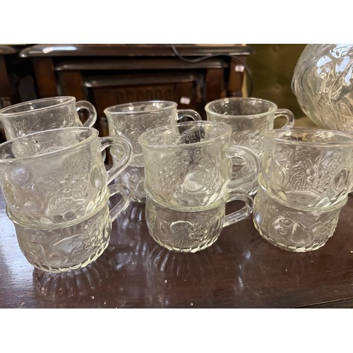 282 - LARGE GLASS PUNCH BOWL WITH 12 CUPS AND A LADLE