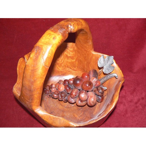 386 - Carved wood basket containing a bunch of agate grapes