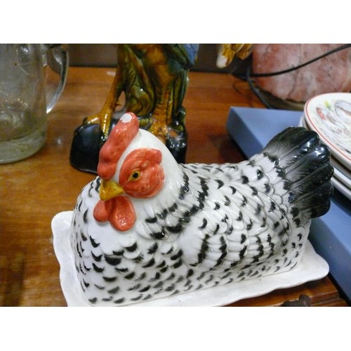 223 - MAJOLICA COCKEREL FIGURE AND A CHICKEN BUTTER DISH