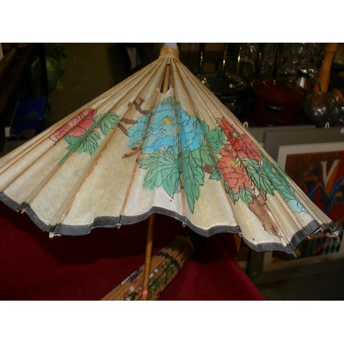 241 - 2 ORIENTAL PARASOLS WITH FLORAL DECORATION