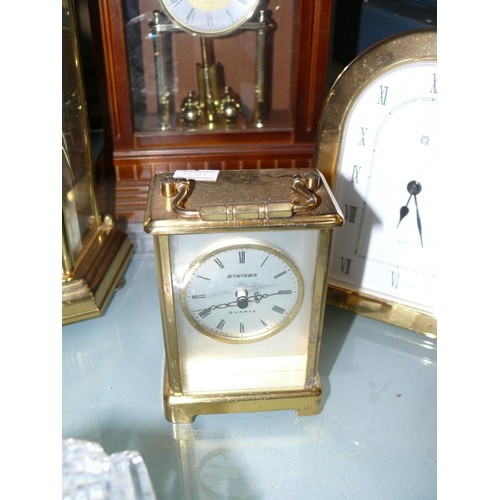 367 - 3 BRASS MANTLE CLOCKS AND 1 WITH WOODEN CASE