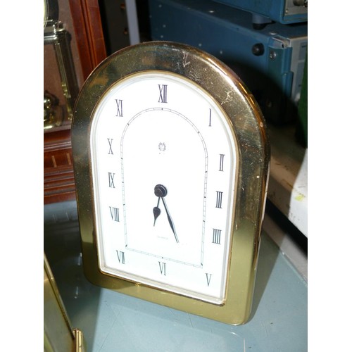 367 - 3 BRASS MANTLE CLOCKS AND 1 WITH WOODEN CASE