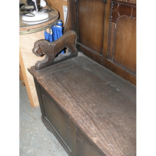 437 - VINTAGE DARK WOOD METAMORPHIC BENCH/TABLE WITH LION ARMS AND LIFT UP TOP FOR STORAGE