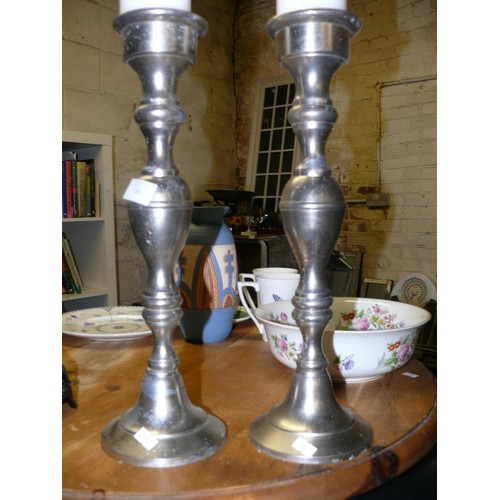 260 - PAIR OF LARGE SILVER CANDLESTICKS WITH WHITE CANDLES