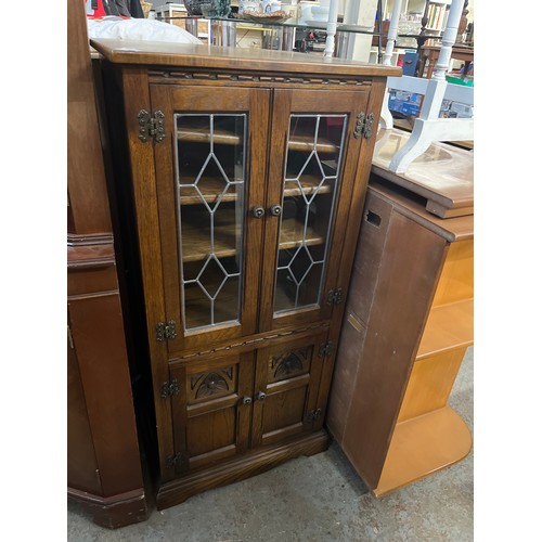 468 - OLD CHARM ENTERTAINMENT UNIT WITH LIFT UP LID, LEADED GLASS DOORS TO TOP AND CUPBOARD BELOW