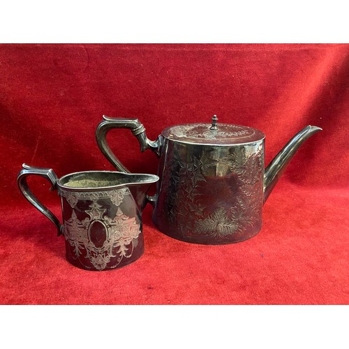 42 - Victorian silver plated tea pot, engraved with a foliate design. Marks on the underside for Lloyd, P... 