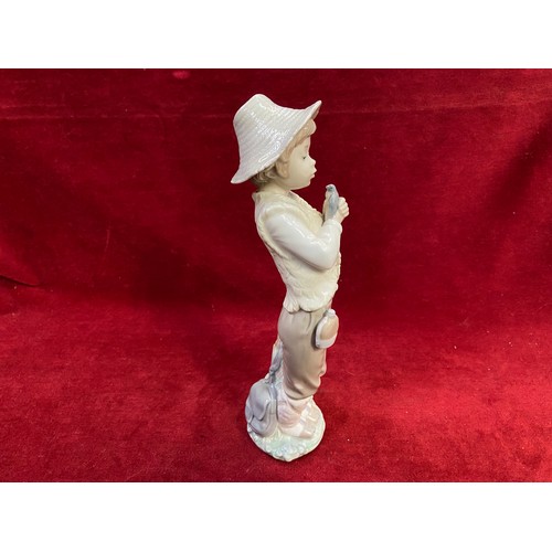 54 - Shepherd boy with bird - Lladro Nao porcelain figurine. Glossy finish.