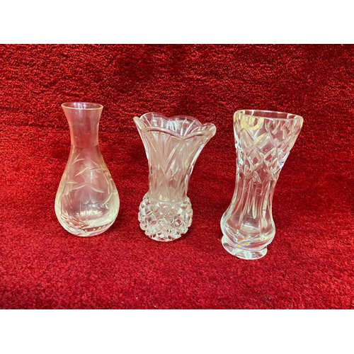 333A - Collection of leaded crystal cut glass tableware, including decanter, lidded jar, bud vases and etch... 