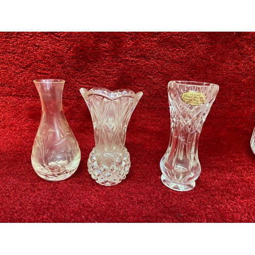 333A - Collection of leaded crystal cut glass tableware, including decanter, lidded jar, bud vases and etch... 