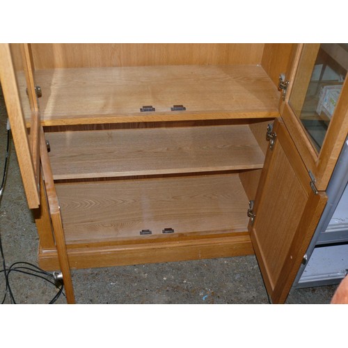 512 - LARGE OAK DISPLAY CABINET WITH GLAZED DOORS TO TOP AND CUPBOARD BELOW