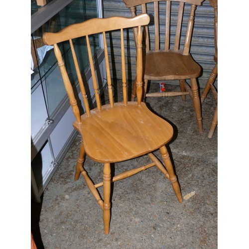 509 - A PAIR OF BEECH DINING CHAIRS WITH SPINDLE BACKS PLUS A FURTHER PAIR WITH SLAT BACKS