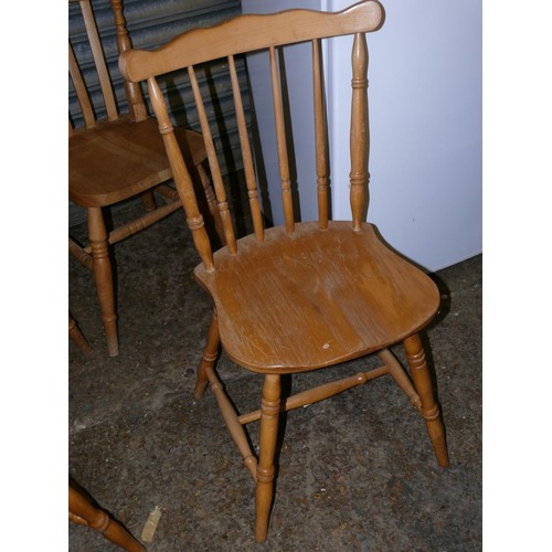 509 - A PAIR OF BEECH DINING CHAIRS WITH SPINDLE BACKS PLUS A FURTHER PAIR WITH SLAT BACKS