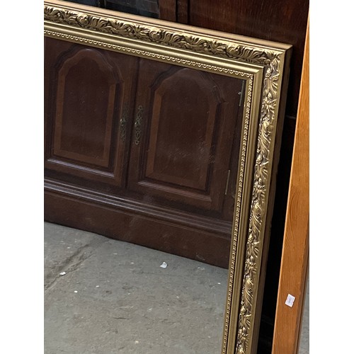 488 - LARGE RECTANGULAR PINE FRAMED WALL MIRROR AND AN ORNATE GILT FRAMED WALL MIRROR