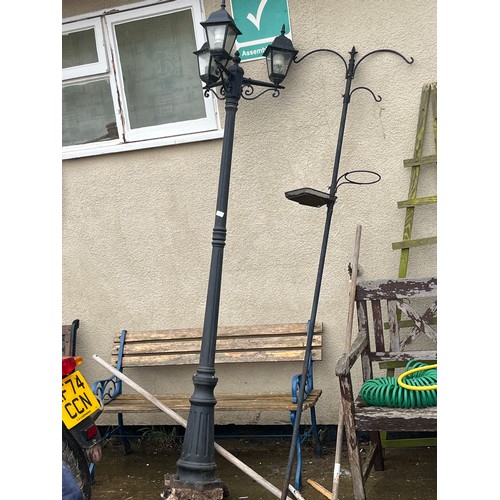 554 - LARGE METAL GARDEN LAMPOST AND A BIRD FEEDER STAND