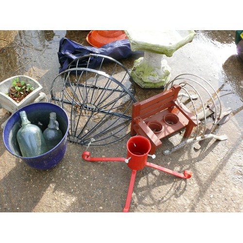 557A - A BIRDBATH, 4 PLANTERS, CHRISTMAS TREE STAND, 2 BIKE STANDS, FOLDING CHAIR AND AN AXE