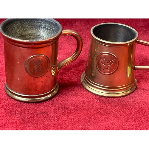 82 - 3 X BRASS AND COPPER COLLECTORS RUM SHOT TANKARDS AND A MEASURE