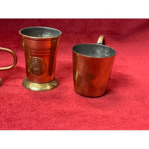 82 - 3 X BRASS AND COPPER COLLECTORS RUM SHOT TANKARDS AND A MEASURE