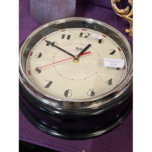 119 - ROUND WALL CLOCK WITH RED METAL SURROUND BY SCOTTS OF STOW AND A ROUND BLACK PLASTIC WALL CLOCK 'RET... 