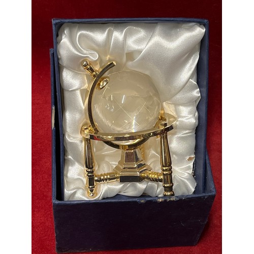 9 - A CRYSTAL GLOBE IN A BRASS STAND WITH ORIGINAL BOX