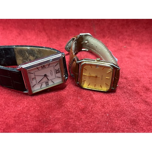 19 - 2 ROTARY WRIST WATCHES WITH SQUARE DIALS ONE BLACK NUMERALS N WHITE DIAL THE OTHER GILT DIAL WITH NE... 