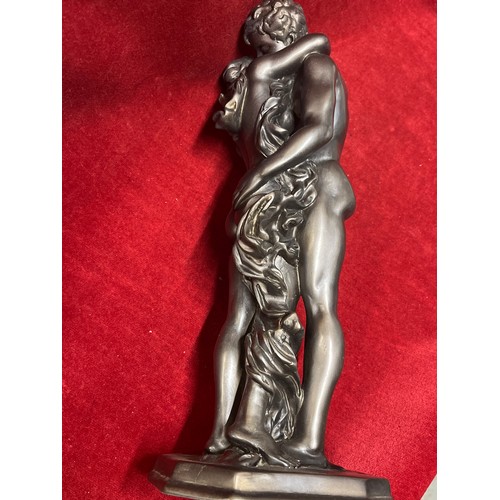 26 - A BRONZE RESIN STATUE OF EMBRACING LOVERS - 15 INCHES HIGH