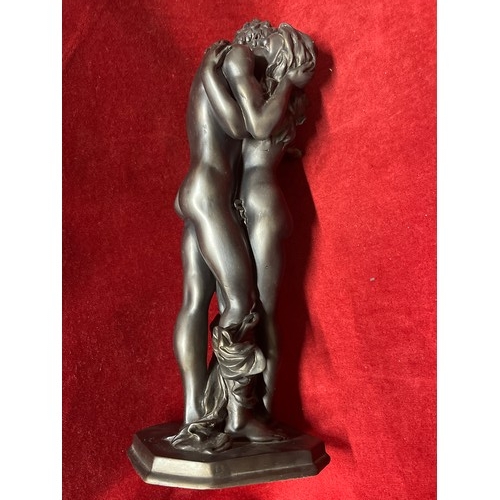 26 - A BRONZE RESIN STATUE OF EMBRACING LOVERS - 15 INCHES HIGH