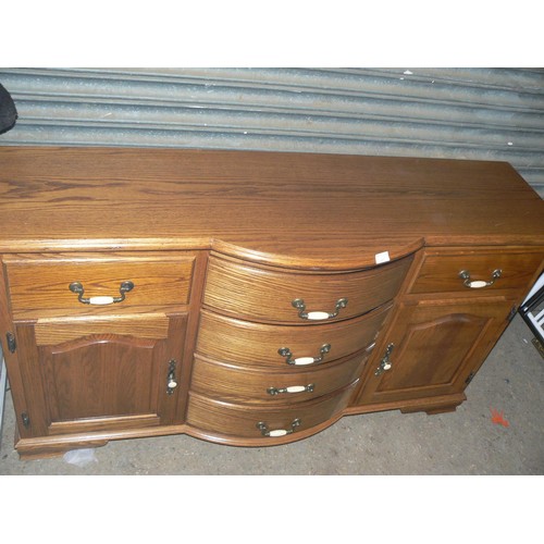 487 - LARGE BOW FRONTED SIDEBOARD WITH 6 DRAWERS AND 2 CUPBOARDS