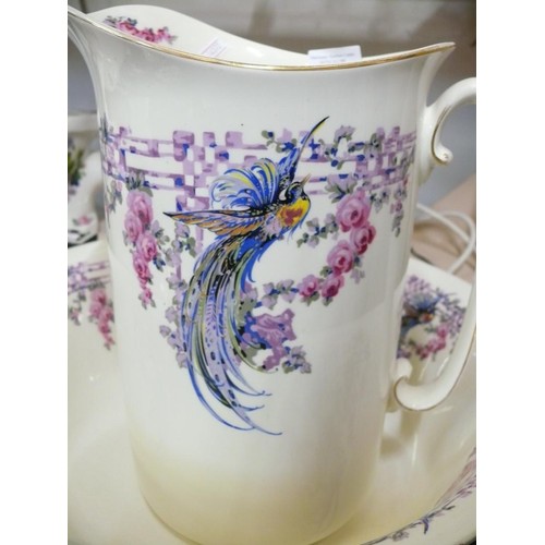 60 - LARGE CERAMIC JUG AND BOWL SET WITH BIRD OF PARADISE DESIGN