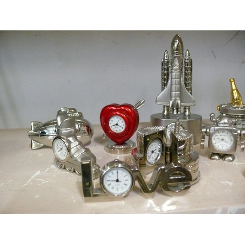 71 - COLLECTION OF NOVELTY MINIATURE CLOCKS SPACE SHUTTLE, CHAMPAGNE ICE BUCKET, STEERING WHEEL, BIRTHDAY... 