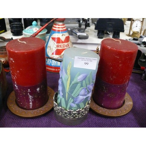 99 - 3 LARGE DECORATIVE PILLAR CANDLES WITH STANDS