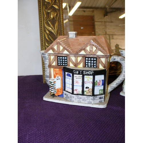 122 - 6 CERAMIC TEAPOTS FROM 'THE VILLAGE COLLECTION' BY ANNIE ROWE FLORIST, THE RED LION, CHEMIST, BOUTIQ... 