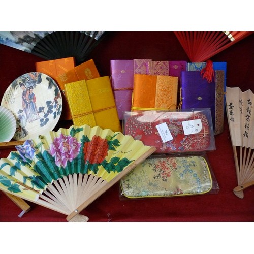 184 - 8 SILK COVERED NOTEBOOKS WITH HANDMADE PAPER, 2 BROCADE SPECTACLES CASES AND 5 FANS